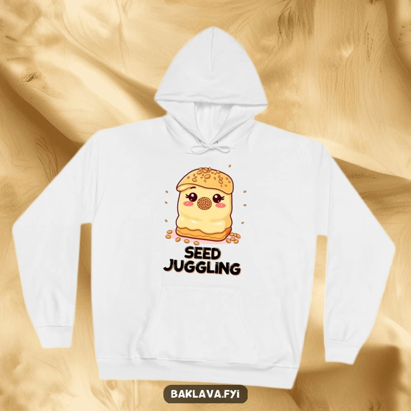 Funny Hoodie: A baklava with a sprinkle nose juggles sesame seeds, a funny symbol of sweet entertainment.
